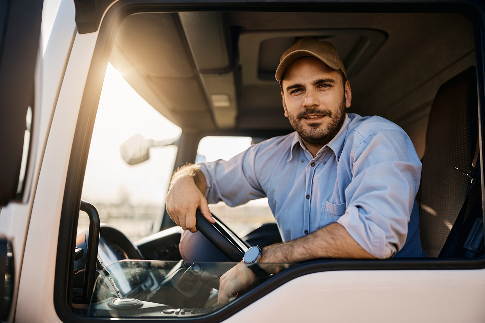 Happy employee in a truck